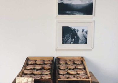 Crosstown Vanilla doughnuts in wooden boxes