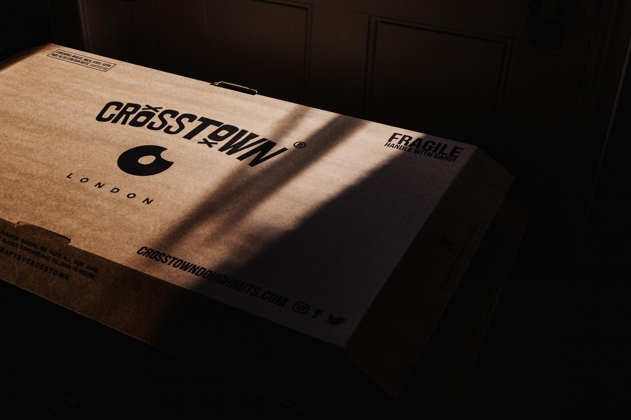 Crosstown packaging box